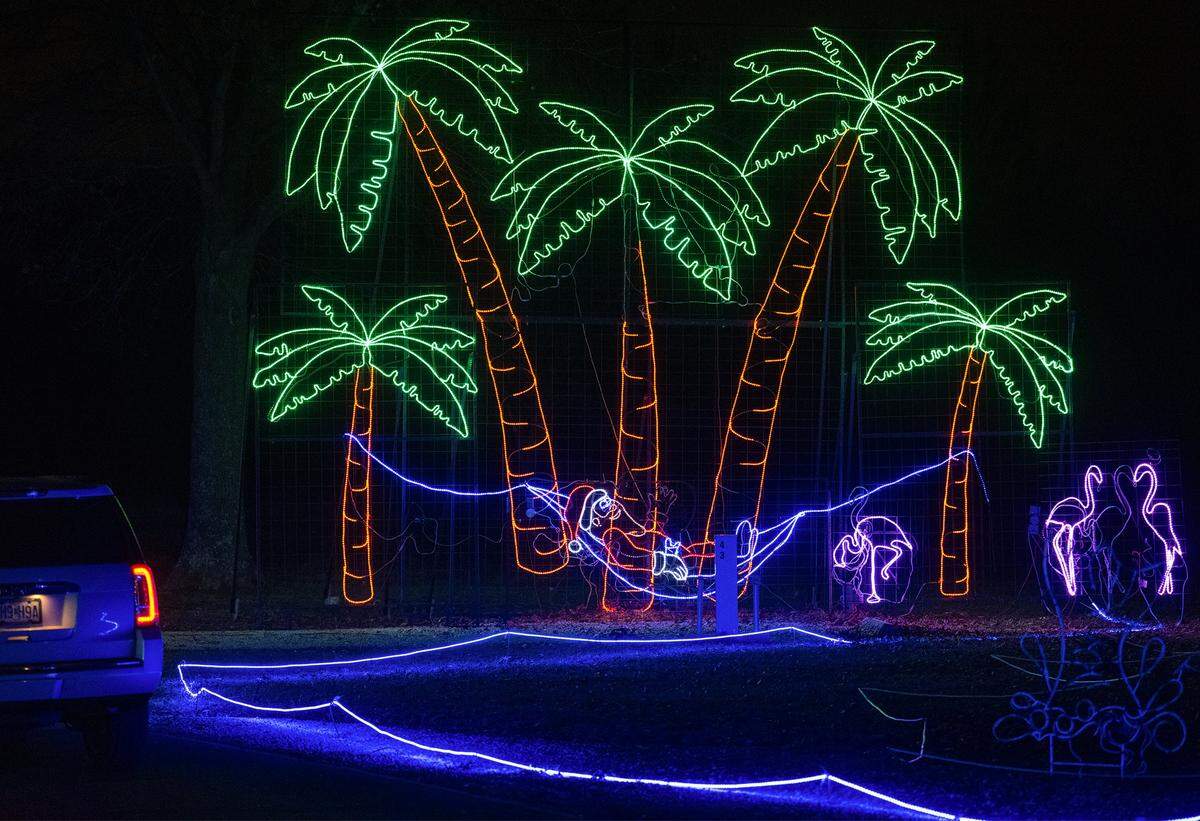 Santa in a hammock display at Christmas in the Park, a huge, free drive-thru light show on Wednesday, Dec. 10, 2025, at Longview Lake in Kansas City. The display, staged by Jackson County Parks & Rec, features more than one million lights and over 200 animated displays. It is the 38th year for the popular display.