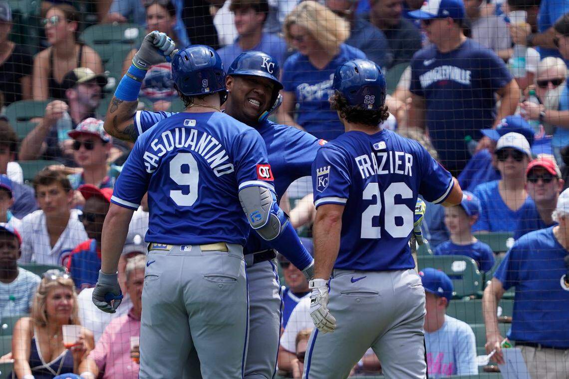 Kansas City Royals first baseman Vinnie Pasquantino, designated hitter Salvador Perez and second baseman Adam Frazier celebrate Pasquantino’s two-run homer against the Cubs at Wrigley Field in Chicago on Wednesday, July 23, 2025.