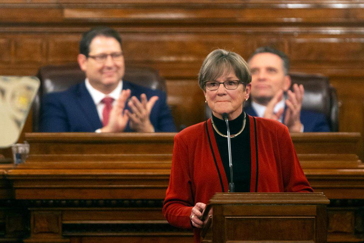Gov. Laura Kelly is applauded as she begins addressing the Kansas Legislature for the annual State of the State, Tuesday, Jan. 11, 2022, in Topeka, Kan.