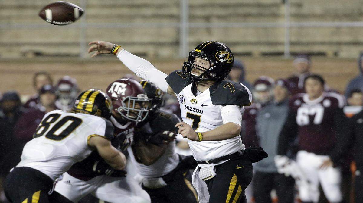 Missouri quarterback Maty Mauk (7) throws a pass against Texas A&M during the first quarter of an NCAA college football game Saturday, Nov. 15, 2014, in College Station, Texas. 