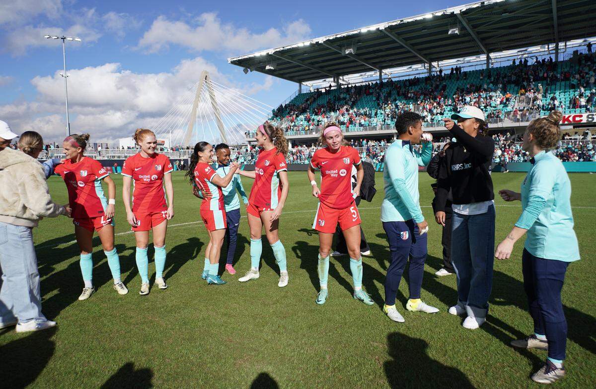Kansas City Current players celebrate after defeating the North Carolina Courage in a NWSL playoff match at CPKC Stadium on Saturday, Nov. 9, 2024.