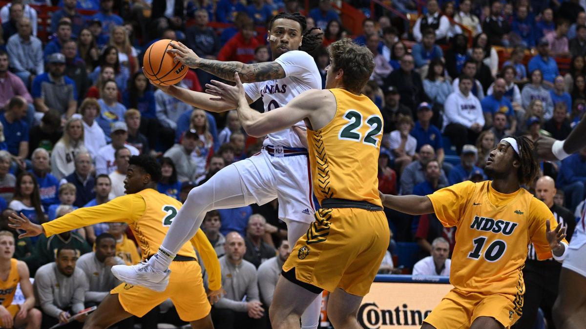 KU’s Bobby Pettiford drives to the basket on NDSU’s Joshua Streit during the first half of Thursday night’s game at Allen Fieldhouse.