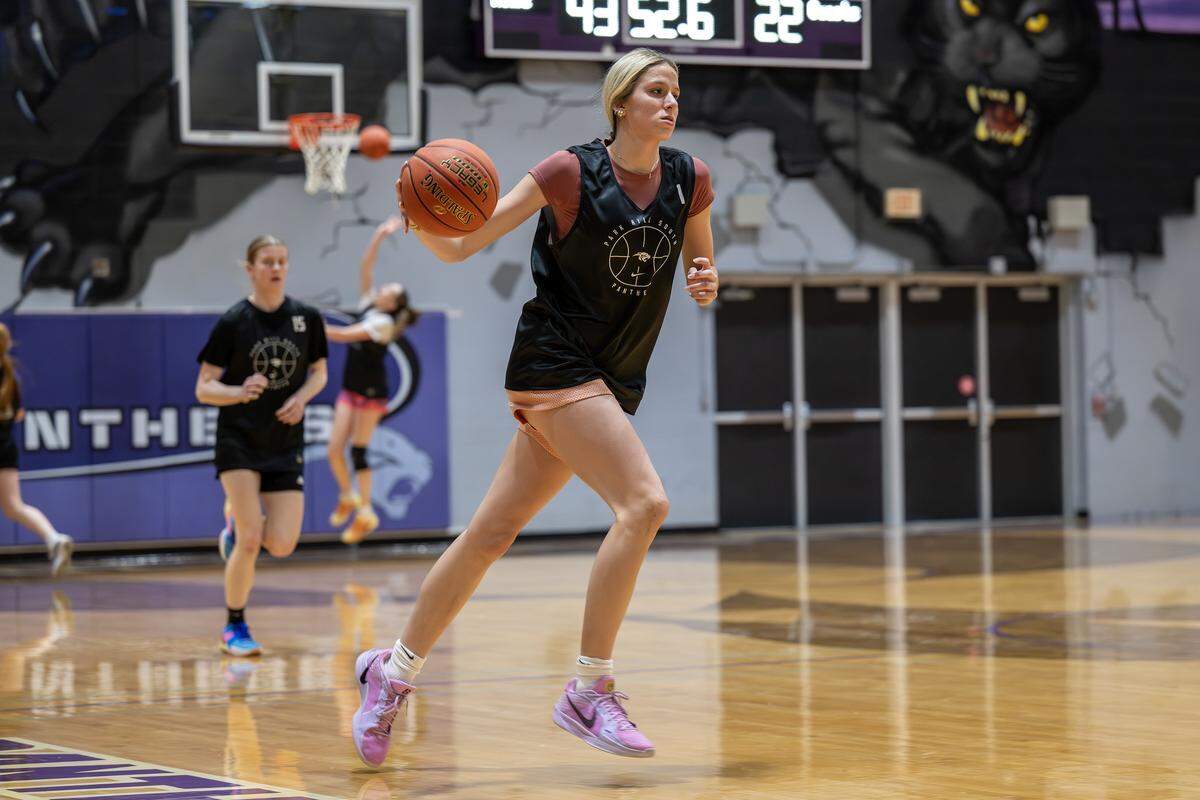Addison Bjorn runs a drill during basketball practice at Park Hill South High School on Wednesday, Jan. 21, 2026, in Riverside.