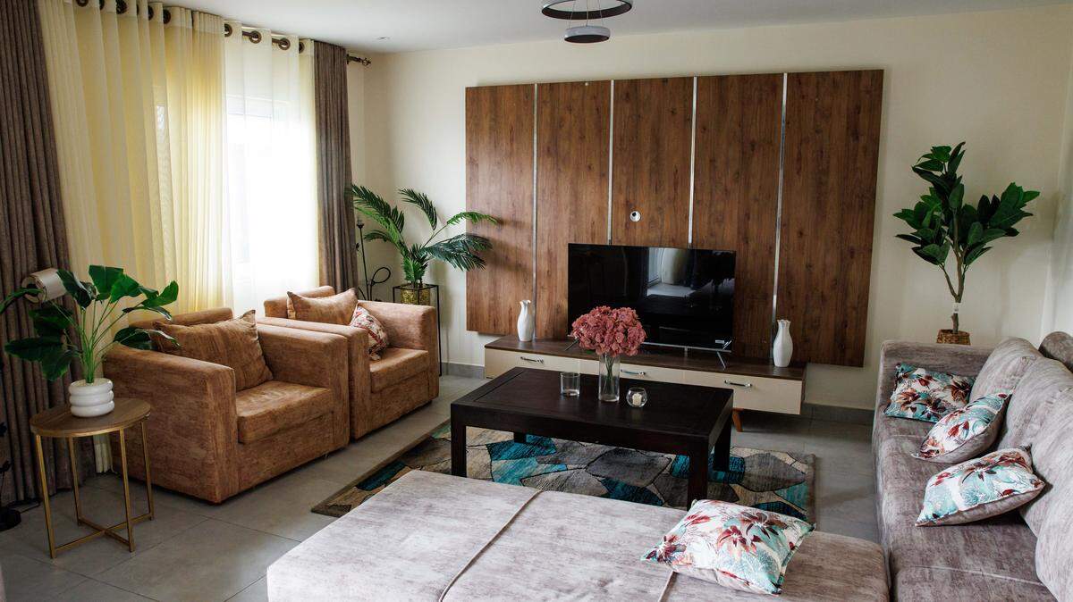 A living room with plants.
