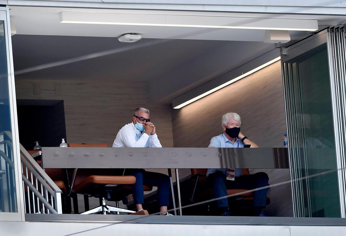Royals general manager Dayton Moore, left, and owner John Sherman watched an intrasquad game during the Kansas City Royals spring training 2.0 at Kauffman Stadium Monday, July 7, 2020.