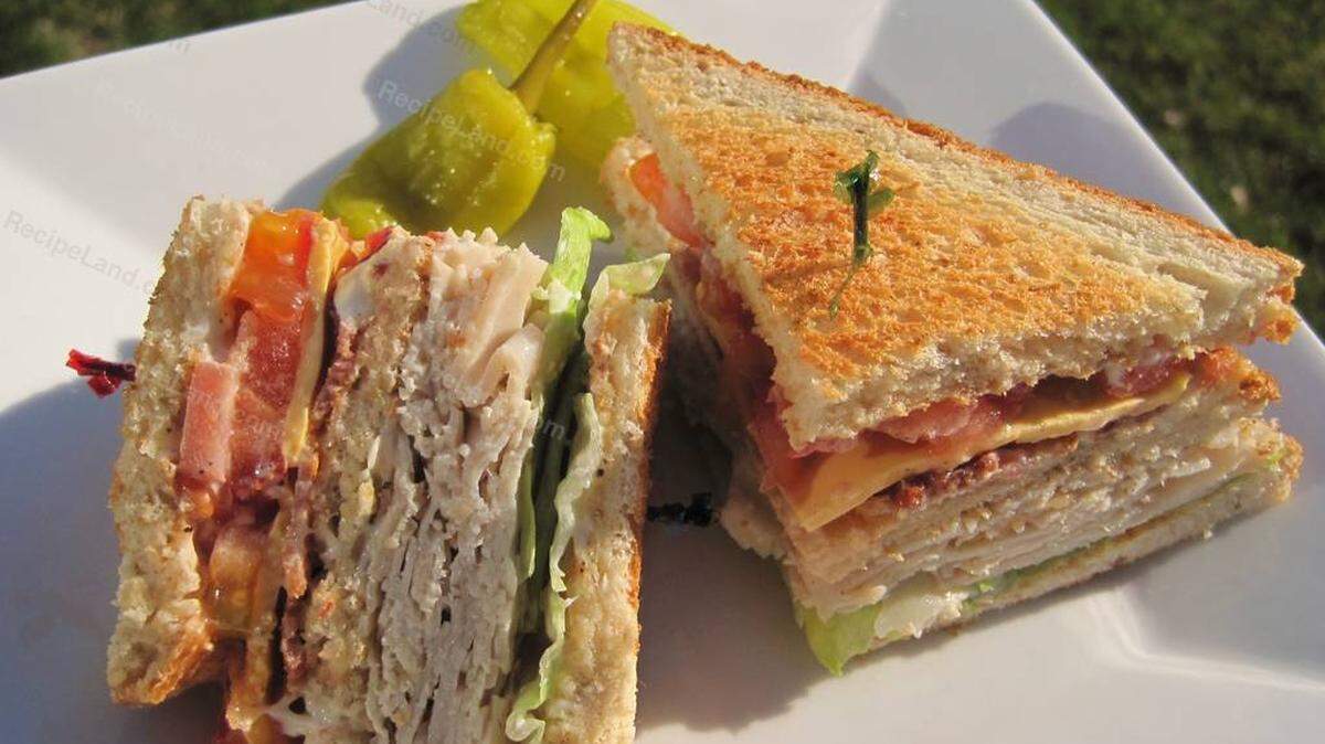 The Dugout Deli’s The Clubhouse with ham, turkey, bacon, cheddar and Swiss, tomatoes and mayo.