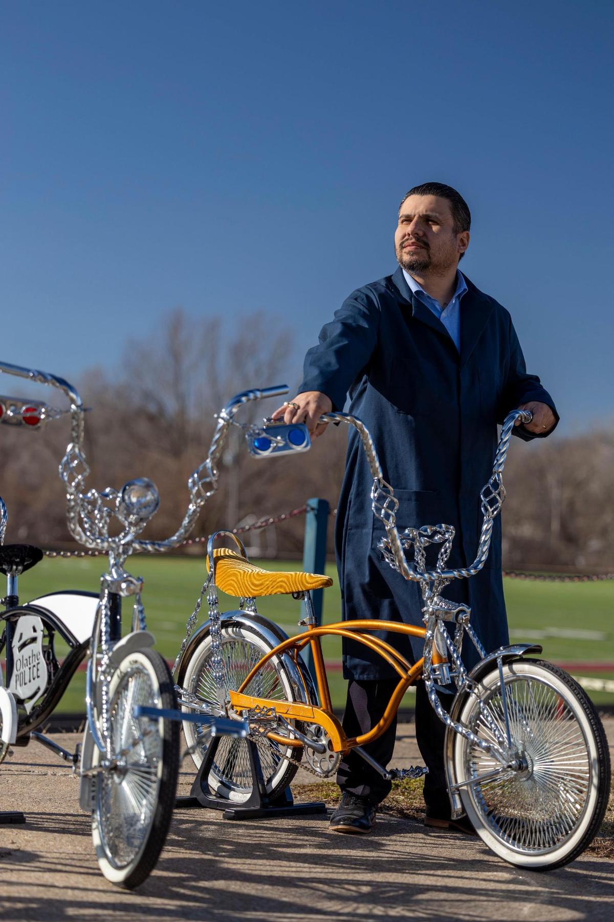 Erik Erazo, executive director of diversity and engagement for the Olathe school district, has created programs that have changed the lives of dozens of Hispanic and at-risk students, including a lowrider bike club for high schoolers.