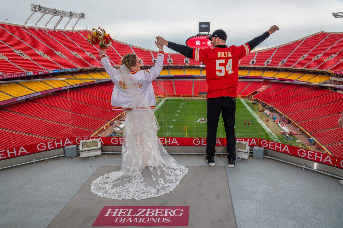 Jordyn Burnidge and Chad Clauser, of Kansas City, North, exchanged wedding vows on the GEHA Deck at Arrowhead Sunday after winning a contest conducted by Helzberg Diamonds to be married at a Chiefs home game.