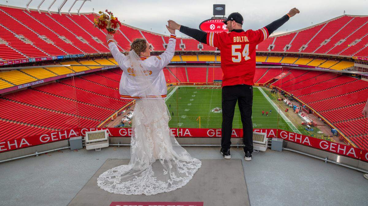 Jordyn Burnidge and Chad Clauser, of Kansas City, North, exchanged wedding vows on the GEHA Deck at Arrowhead Sunday after winning a contest conducted by Helzberg Diamonds to be married at a Chiefs home game.