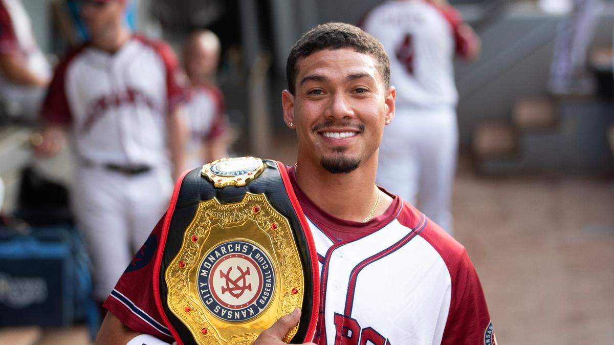 Infielder Edwin Diaz, a former Athletics, Astros and Red Sox prospect, poses with a Monarchs championship belt during a game in the 2023 season.