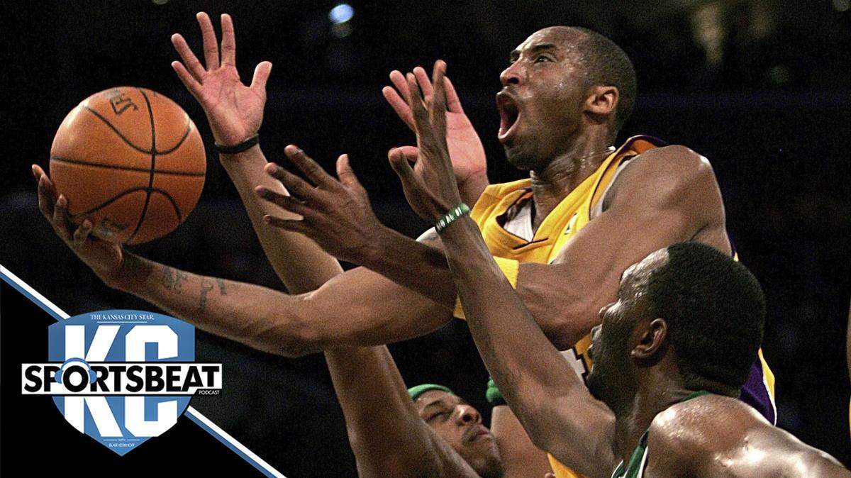 In this Feb. 23, 2007, photo, the Los Angeles Lakers’ Kobe Bryant, top, goes up for a shot between Boston Celtics’ Paul Pierce, left, and Al Jefferson. Bryant, Tim Duncan and Kevin Garnett were all announced as members of the 2020 class for the Basketball Hall of Fame.