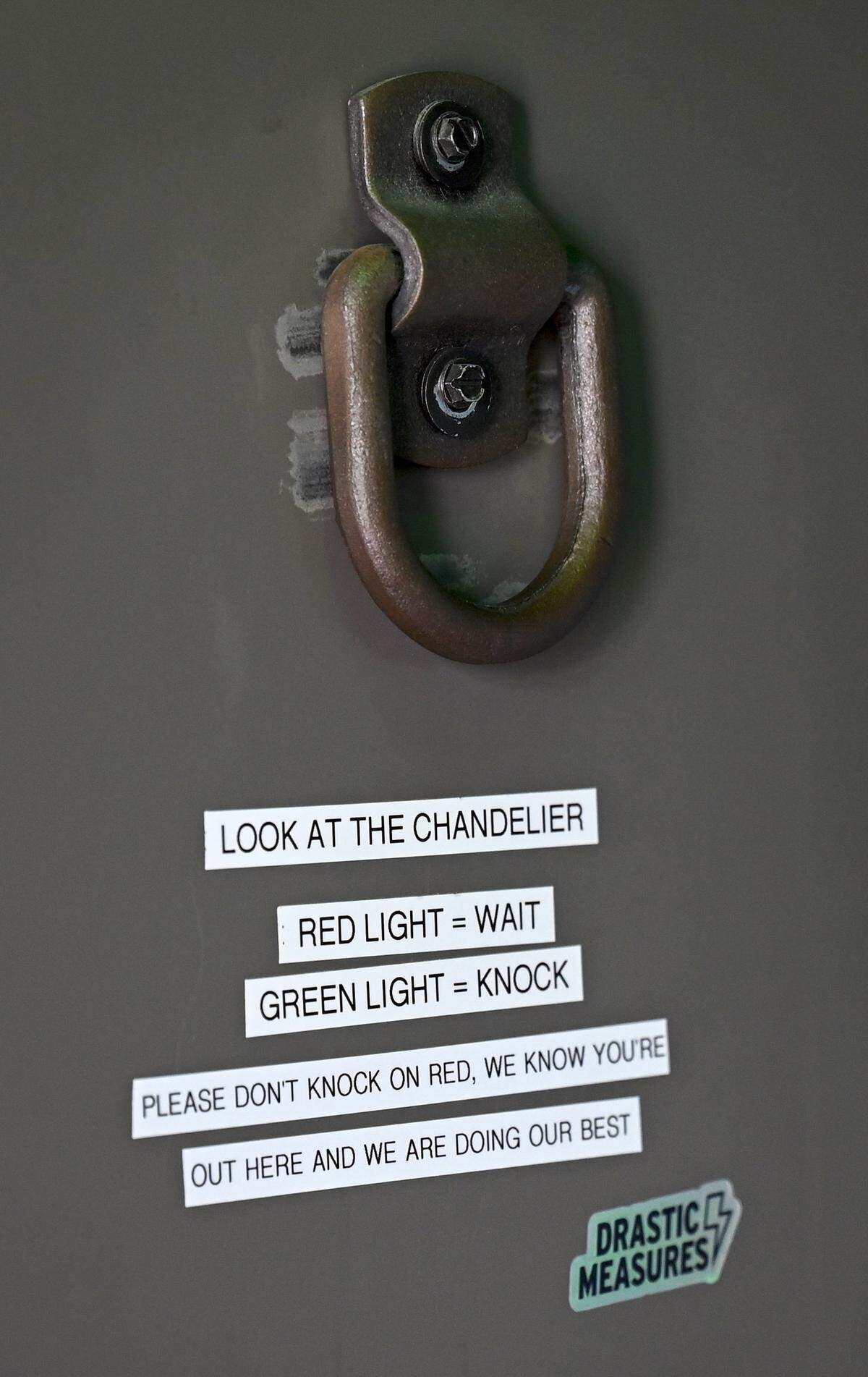 Instructions for entry to Drastic Measures, an intimate 40-seat cocktail-only bar in Shawnee, are posted on the door in a vestibule just outside of the bar. 