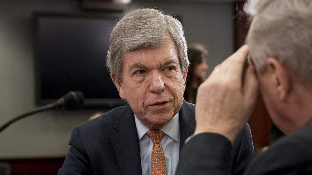 Sen. Roy Blunt of Missouri talks with Sen. Dick Durbin of Illinois on Wednesday.