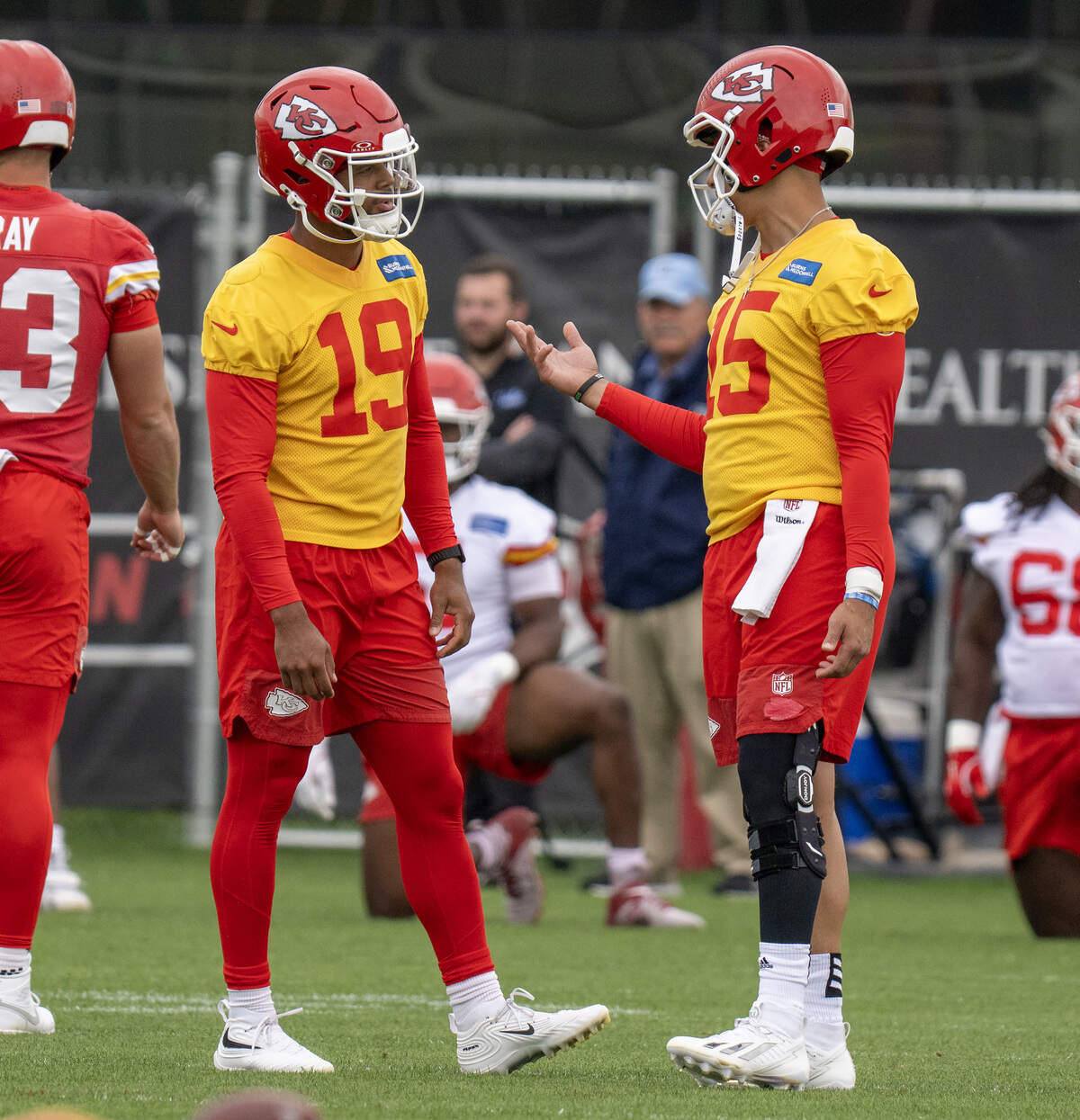 Chiefs quarterbacks Chris Oladokun (19) and Patrick Mahomes (15) warm up during Day 2 of minicamp practice at the team’s facility in Kansas City on Wednesday, June 10, 2026.