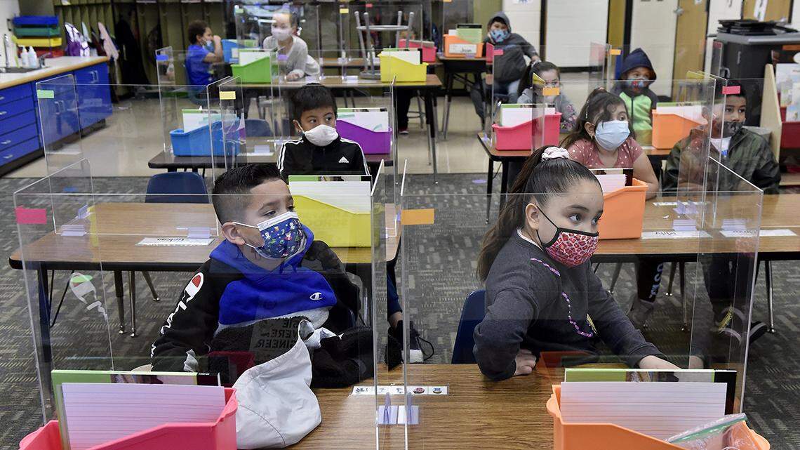 Johnson County officials will decide this week​ whether to end their current school mask mandate for elementary school children or leave it in place through May.