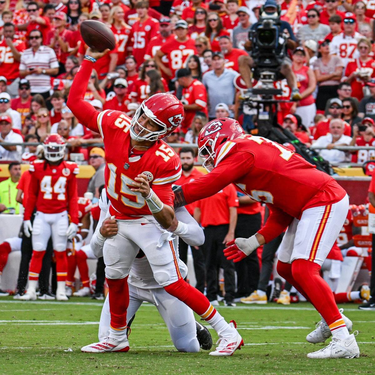 Chiefs quarterback Patrick Mahomes is sacked by Bengals defensive end Trey Hendrickson, who repeatedly got around and through the blocking of rookie left tackle Kingsley Suamataia (right) on Sunday afternoon at GEHA Field at Arrowhead Stadium.