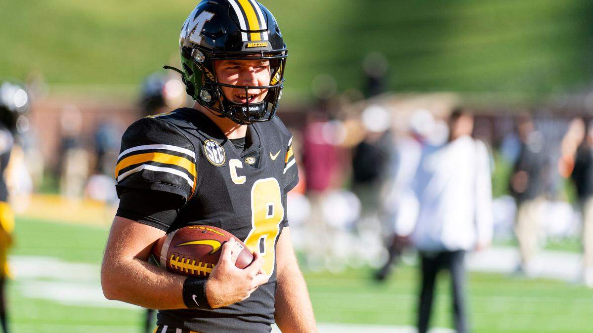 Missouri quarterback Connor Bazelak warms up before the start of an NCAA college football game against Texas A&M Saturday, Oct. 16, 2021, in Columbia, Mo. (AP Photo/L.G. Patterson)