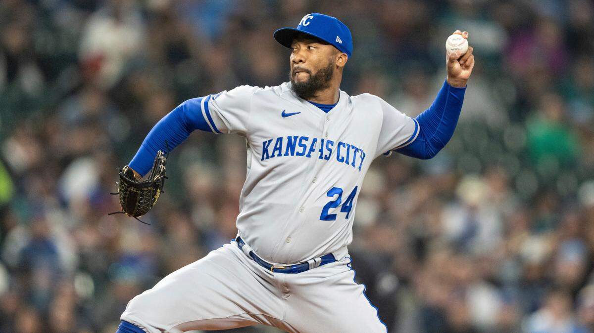 Kansas City Royals reliever Amir Garrett delivers a pitch during a baseball game against the Seattle Mariners, Saturday, April 23, 2022, in Seattle. The Mariners won 13-7. (AP Photo/Stephen Brashear)