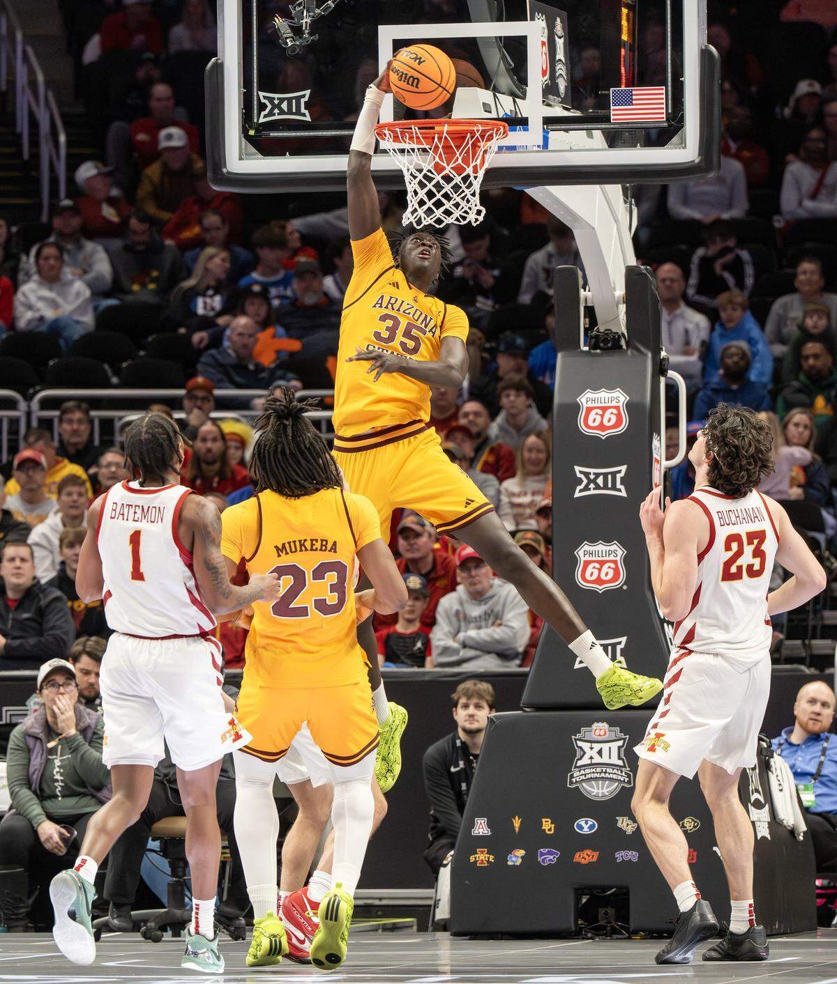 Arizona State Sun Devils center Massamba Diop (35) makes a slam dunk against the Iowa State Cyclones during the second half of a Big 12 Men's Basketball Tournament game at T-Mobile Center on Wednesday, March 11, 2026, in Kansas City.