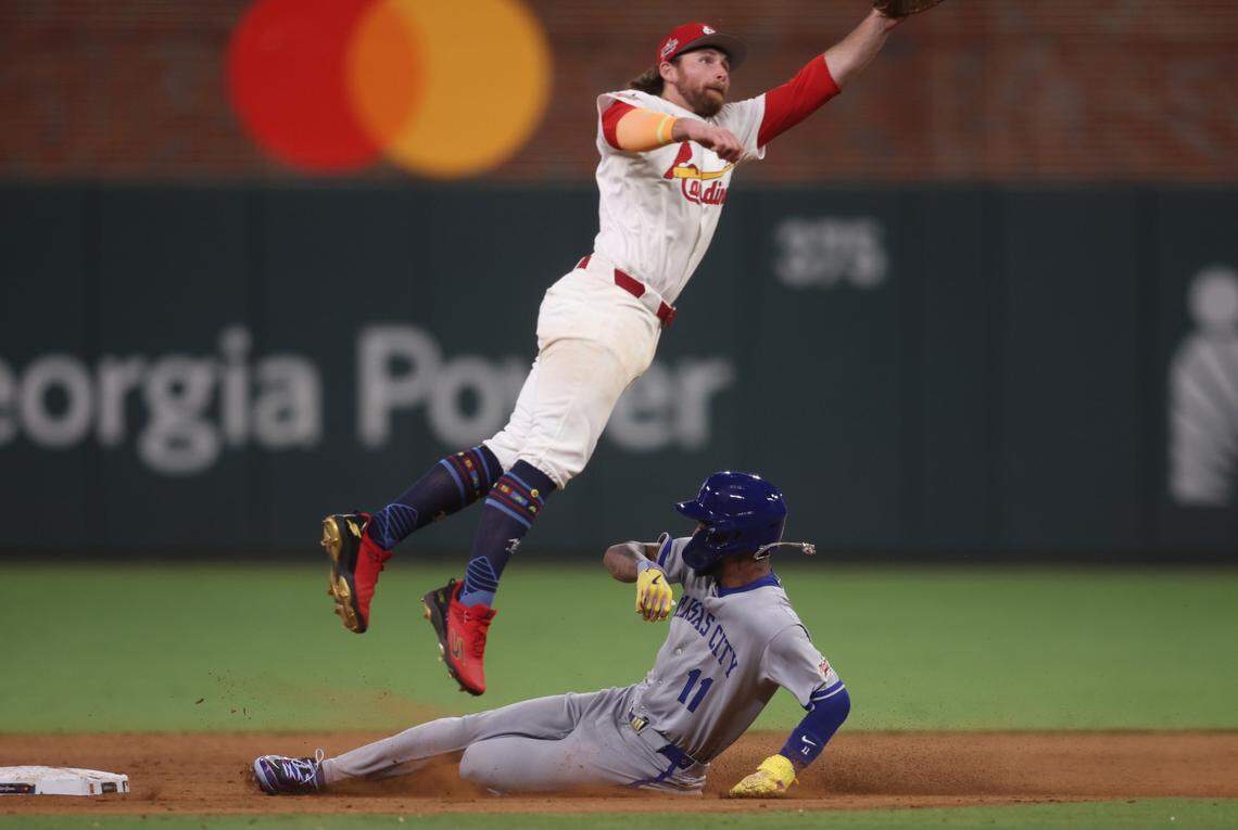 American League third baseman Maikel Garcia of the Kansas City Royals steals second base against National League second baseman Brendan Donovan of the St. Louis Cardinals during the seventh inning of the 2025 MLB All-Star Game at Truist Park in Atlanta on Tuesday, July 15, 2025.