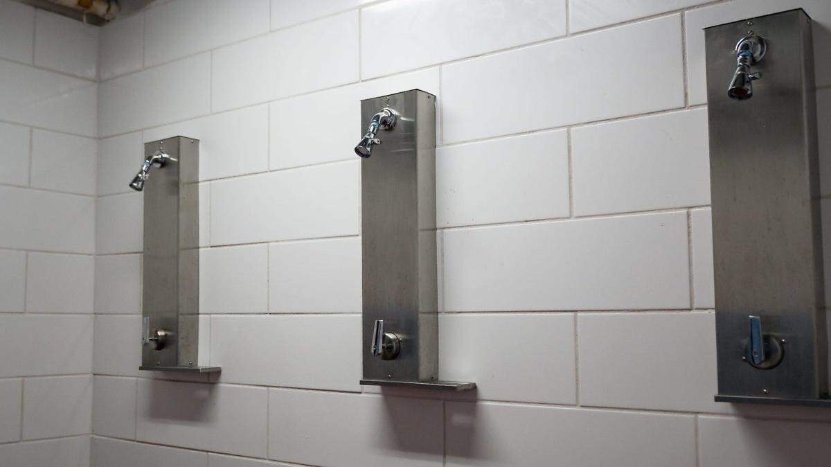 New shower heads line the walls inside of the team locker room at the New Hartford Recreation Center in New Hartford, NY.
