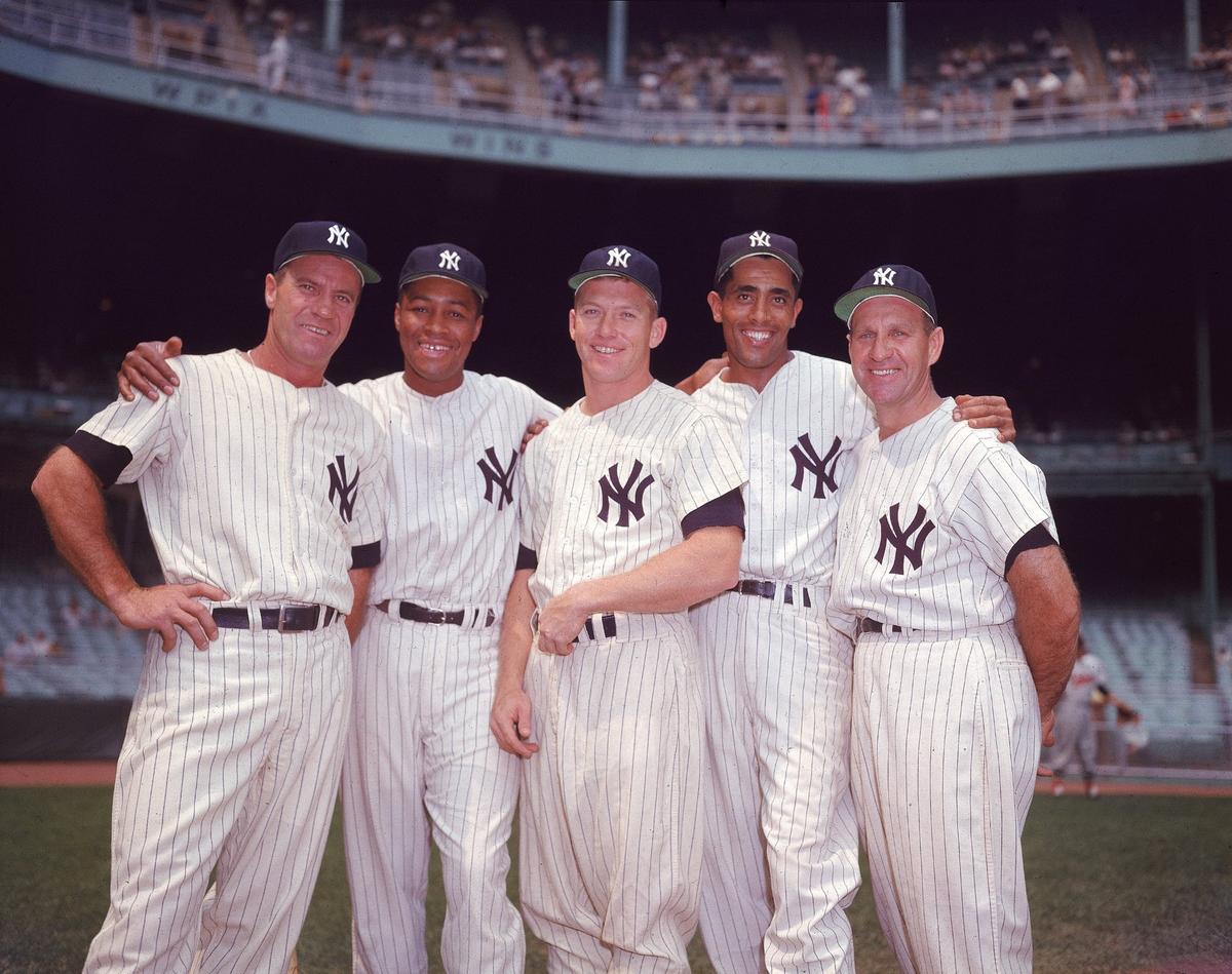 The star power of the New York Yankees helped desegregate Kansas City hotels. In 1955, the team insisted that catcher Elston Howard, second from left, stay in the same hotel as the rest of the team. He’s pictured in 1957 with teammates, from left, Hank Bauer, Mickey Mantle, Harry Simpson and Enos Slaughter.