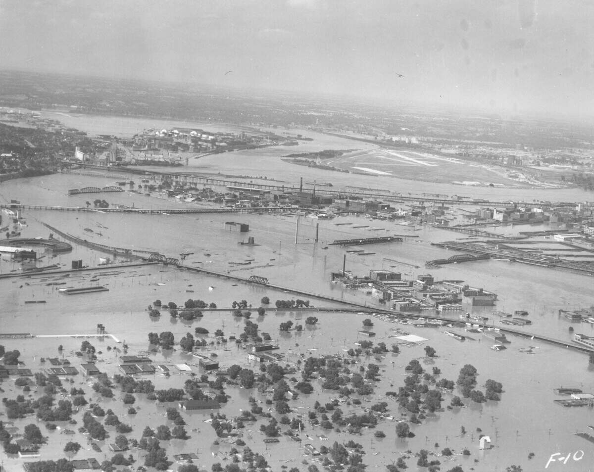 Aerial view looking northwest of the confluence of the flooded Kansas and Missouri rivers, July 1951.