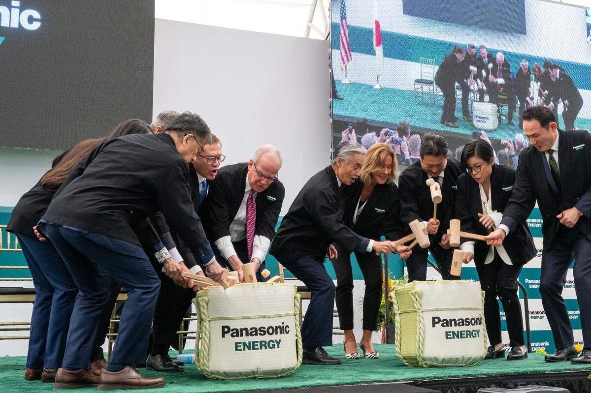 Panasonic executives and local, state and federal representatives use mallets to open sake barrels on stage in celebration of the grand opening of the new Panasonic electric vehicle battery plant on Monday, July 14, 2025 in De Soto, Kansas. Attendees included Sen. Jerry Moran (R-KS), Lt. Gov. David Toland (KS), and U.S. Ambassador of Japan to the United States, Shigeo Yamada.