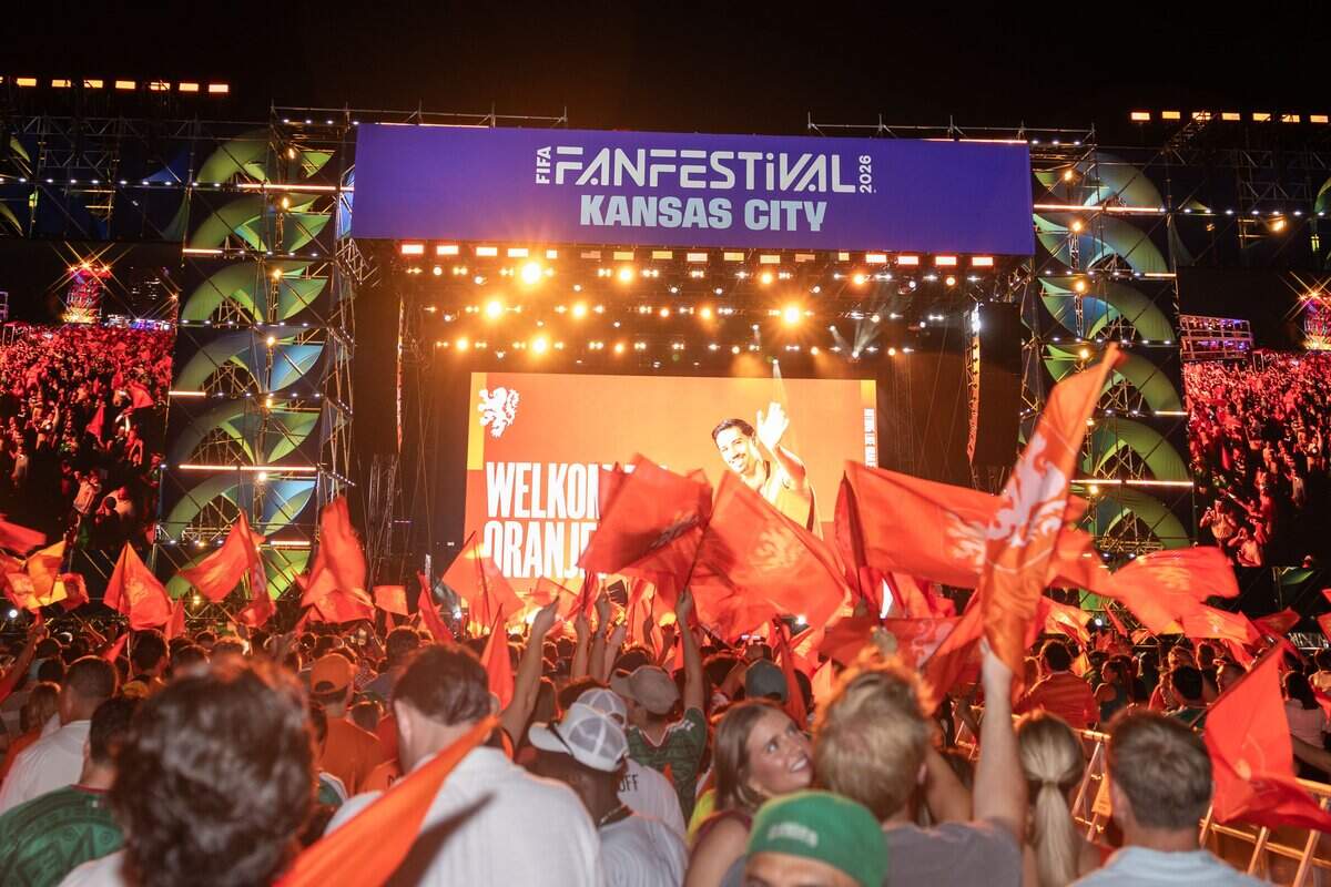 Dutch fans wave their flags and cheer as they celebrate their team during the Bij Oranje Party at Fan Fest on Wednesday, June 24, 2026.