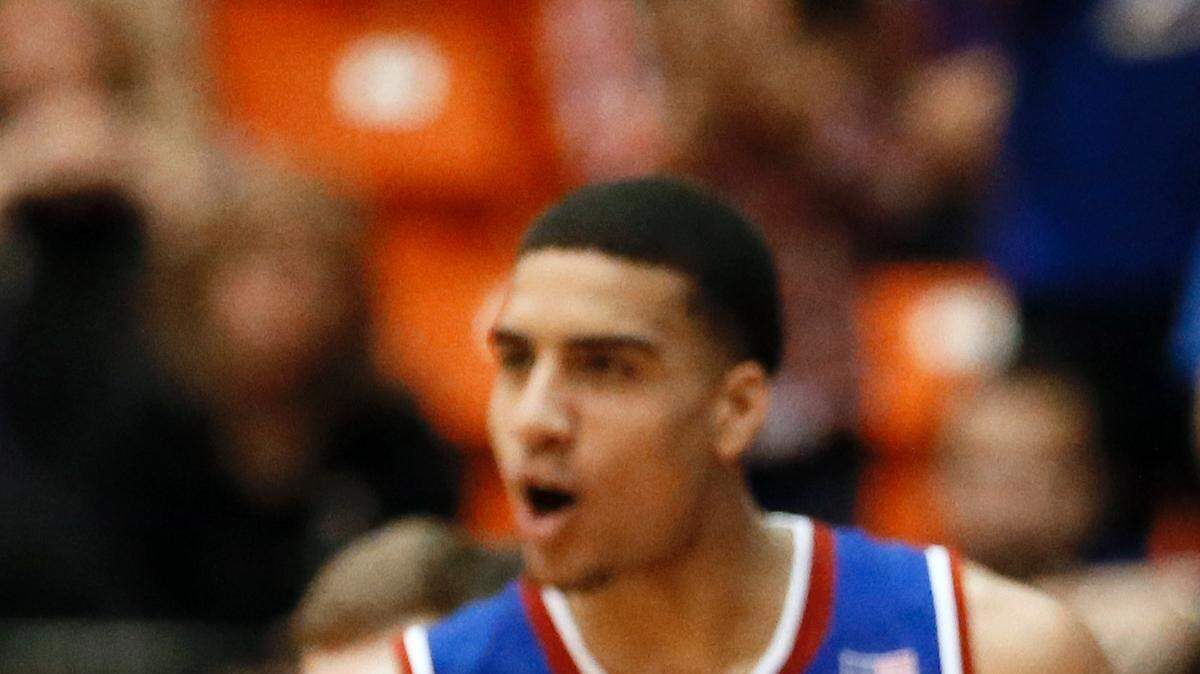 Kansas coach Bill Self, player Landen Lucas (33) and the rest of the bench watch in the closing seconds of an NCAA college basketball game against TCU, Wednesday, Jan. 28, 2015, in Fort Worth, Texas. Kansas won 64-61. (AP Photo/Tony Gutierrez)