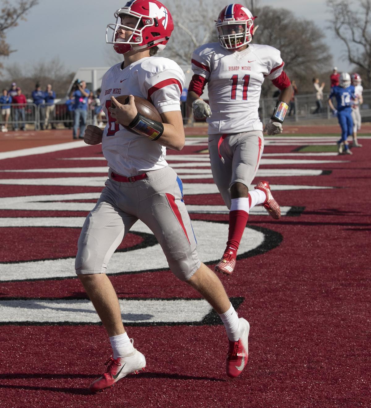 Quarterback Sam Pedrotti of Bishop Miege scored the Stags’ first touchdown Saturday against Goddard.