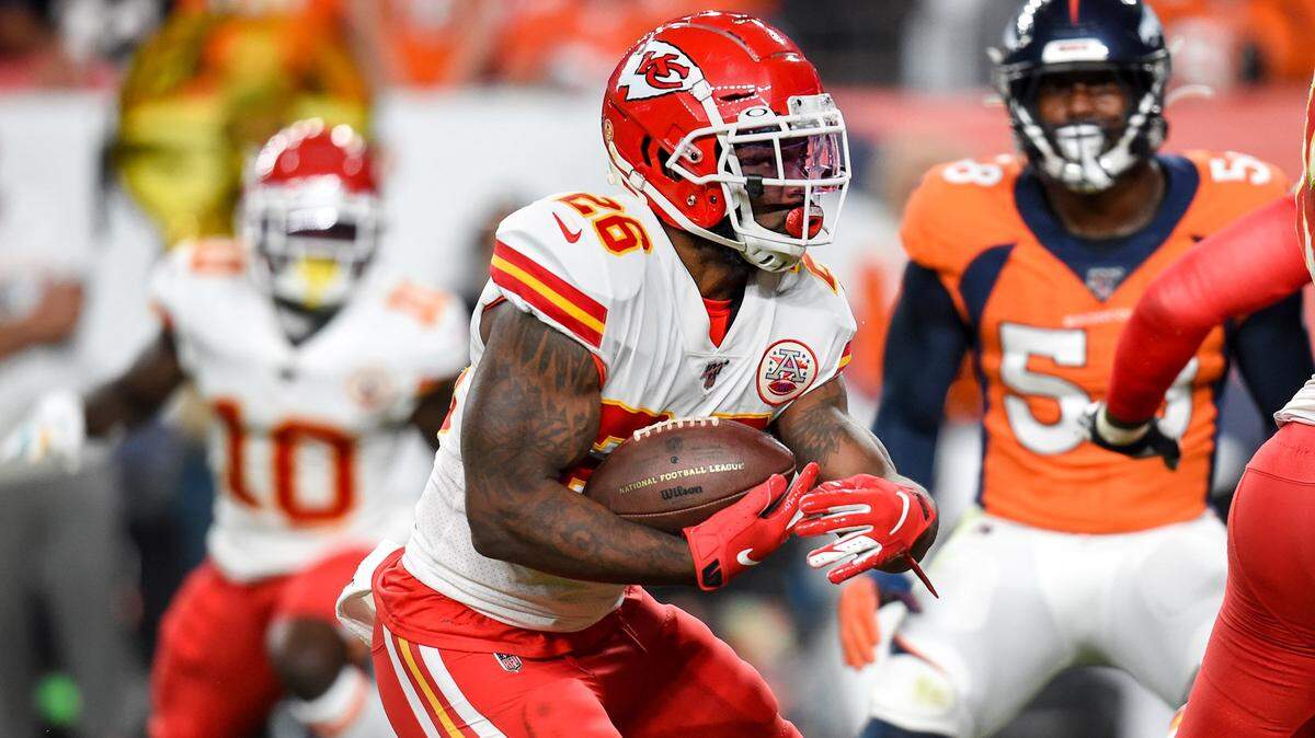 Kansas City Chiefs running back Damien Williams ran for a gain in the second quarter of the game against the Denver Broncos Thursday at Empower Field at Mile High in Denver.