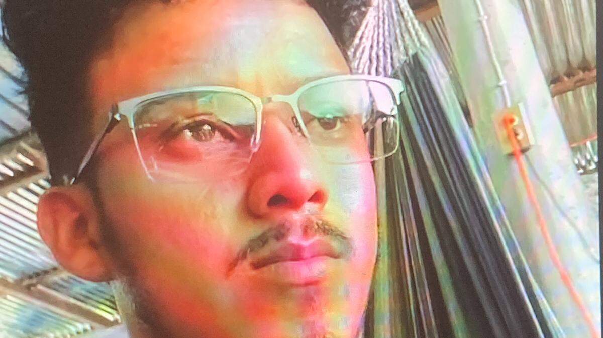 Julio Rojas, 25, of Olathe, who entered the United States 10 years ago seeking asylum, was deported back to El Salvador in September. Seen here in a Zoom photo, he has accused the federal agent who arrested him of excessive force.