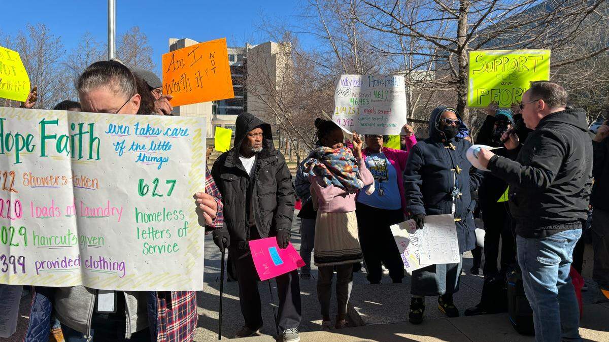 Doug Langner, executive director at Hope Faith Ministries, speaks to protesters across the street from City Hall in Kansas City, advocating for more resources to be allocated to the houseless community on Feb. 29.