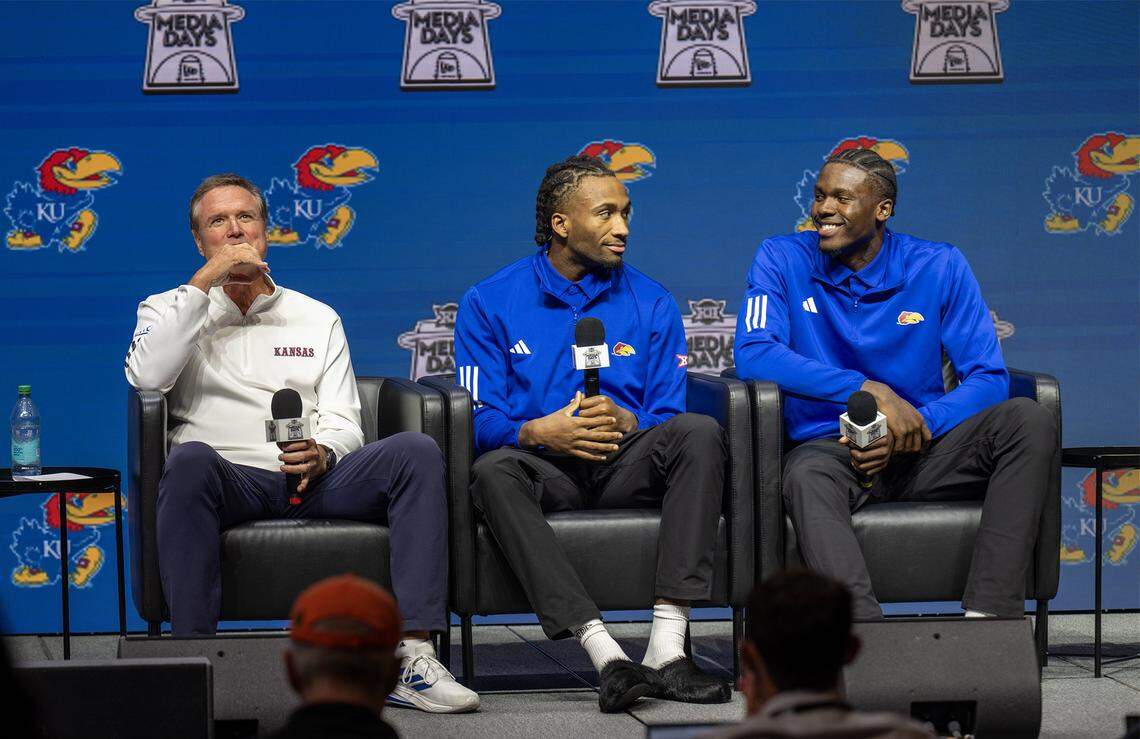Kansas basketball coach Bill Self and players Darryn Peterson and Flory Bidunga answer questions during Big 12 Basketball Media Days at T-Mobile Center on Wednesday, October 22, 2025, in Kansas City.