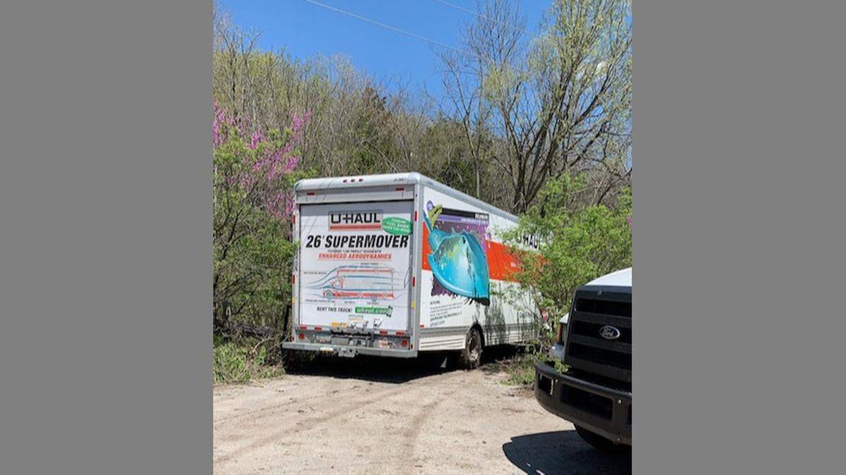 All City Tow helped police by using cranes and winches to pull the stolen U-Haul out of the woods.