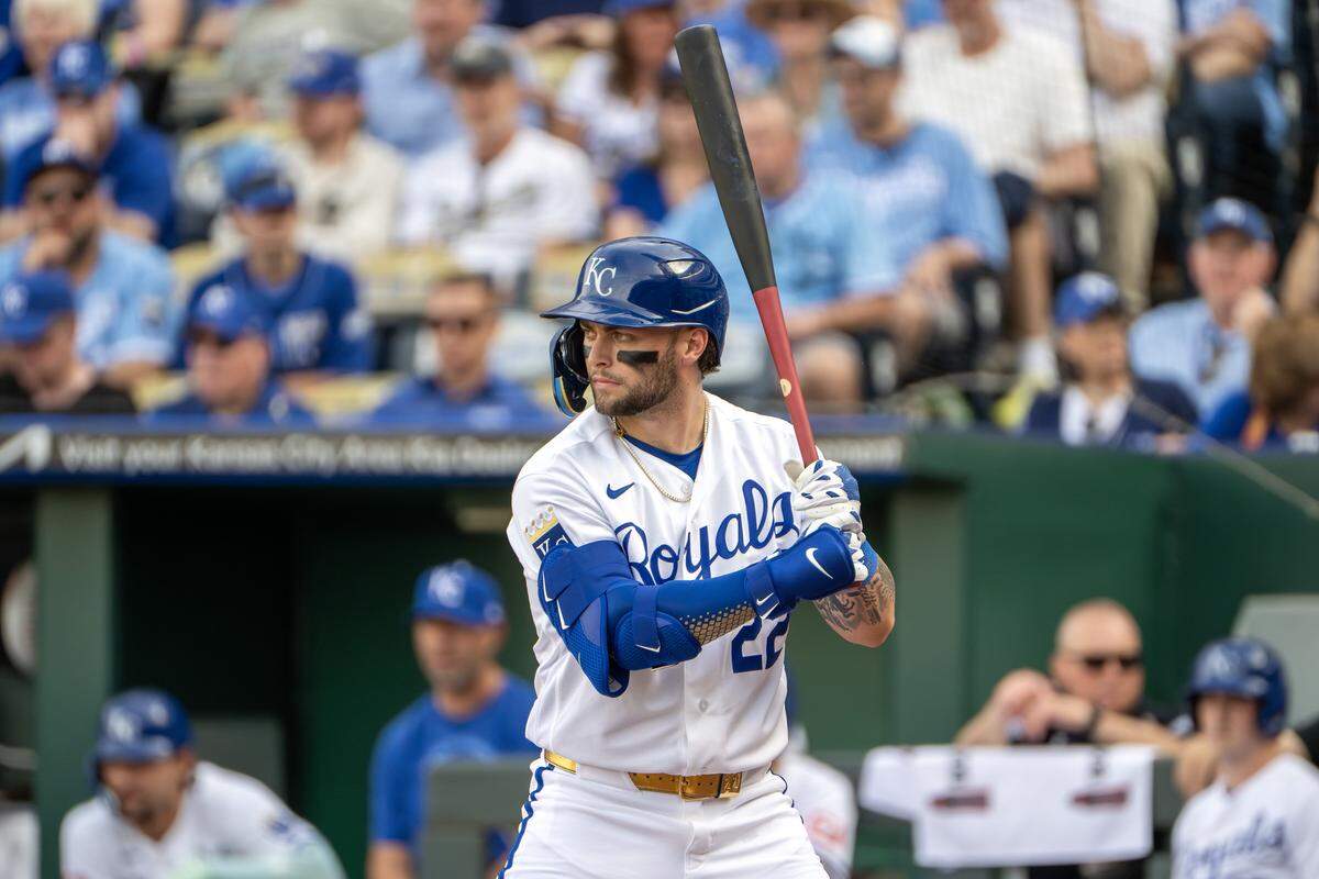 Kansas City Royals catcher Carter Jensen (22) bats in the sixth inning during the home opener game against the Minnesota Twins at Kauffman Stadium on Monday, March 30, 2026, in Kansas City.