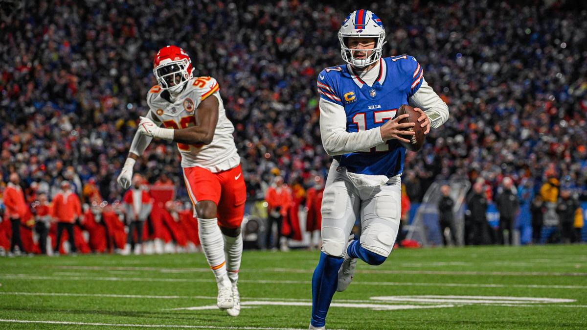 Buffalo Bills quarterback Josh Allen (17) runs in for a touchdown past Kansas City Chiefs defensive end Charles Omenihu (90) in the second quarter Sunday, Jan. 21, 2024, at Highmark Stadium in Orchard Park, New York.