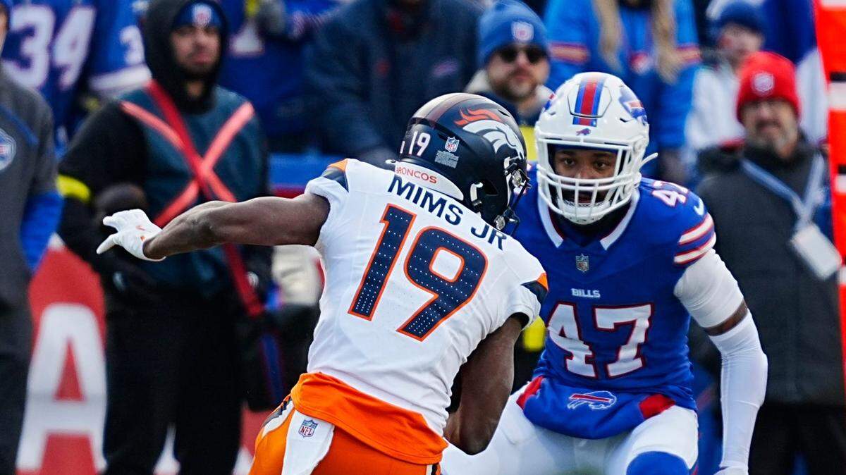 Buffalo Bills cornerback Christian Benford (47) gets ready to tackle Denver Broncos wide receiver Marvin Mims Jr. (19) who was heading towards him during the second half of the Buffalo Bills wild card game against the Denver Broncos at Highmark Stadium in Orchard Park on Jan. 12, 2025.