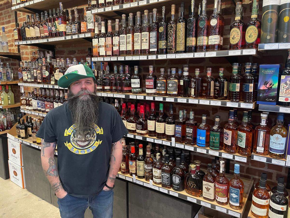 Mat Adkins, owner of Crossroads boutique liquor store The Pairing, opposes the Royals’ proposed stadium site. “This will just make us another Power and Light District.”