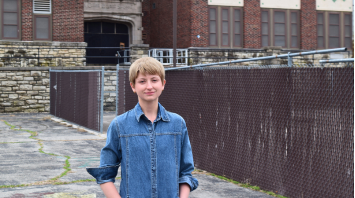 Carter Taylor, an elementary teacher with Kansas City Public Schools and legislative chair of the American Federation of Teachers Local 691, stands outside the vacant Bryant School in Brookside.