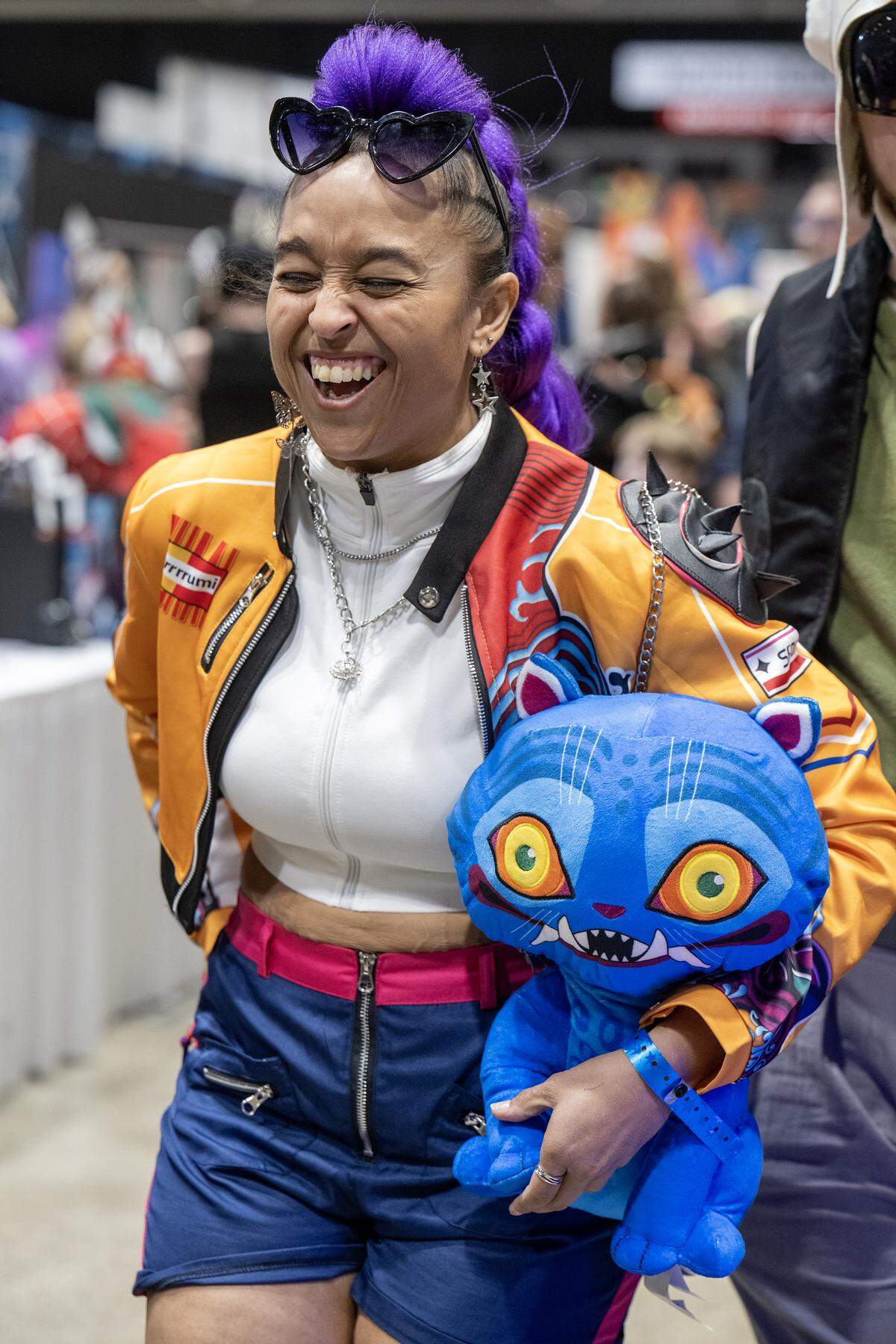 Heather Geran of Kansas City dressed as Rumi of the Kpop Demon Hunters during her visit to Planet Comicon Kansas City at Bartle Hall on Sunday, March 29, 2026.
