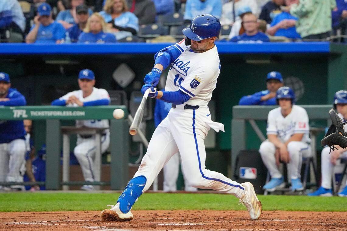 Kansas City Royals second baseman Michael Massey (19) hits a single against the Cincinnati Reds in the second inning at Kauffman Stadium on May 27, 2025.