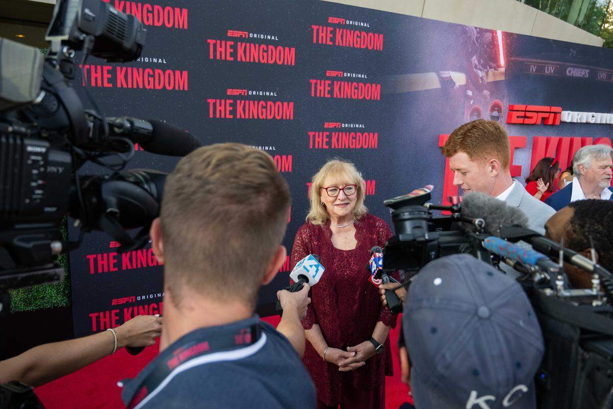 Donna Kelce answers questions from reporters on the red carpet before the special screening of the ESPN six-part series ‘The Kingdom,’ on Sunday, Aug. 24, 2025, in Kansas City.