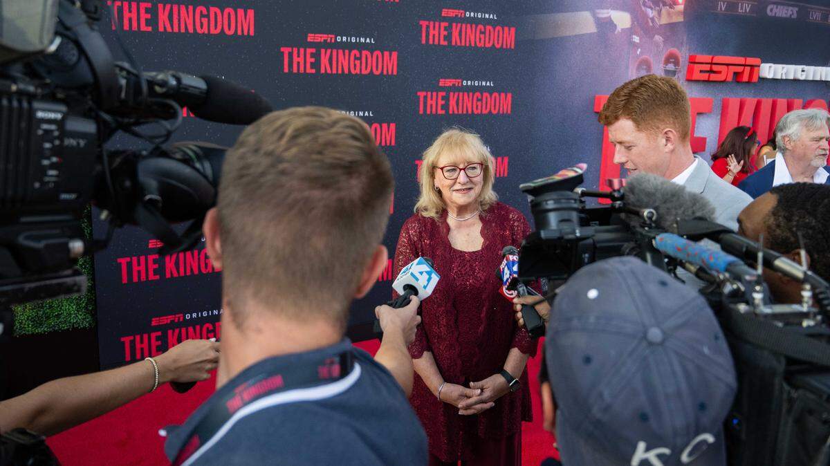 Donna Kelce answers questions from reporters on the red carpet before the special screening of the ESPN six-part series ‘The Kingdom,’ on Sunday, Aug. 24, 2025, in Kansas City.