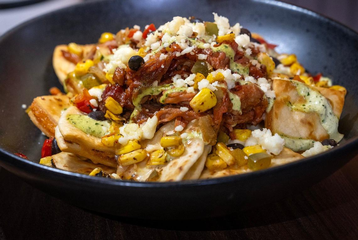 KC-Dilla nachos is a new offering from Aramark for the general concessions at GEHA Arrowhead Stadium. The item features fried chicken quesadillas served with queso cheese and topped with pulled pork, corn, black bean salsas and roasted poblano crema.