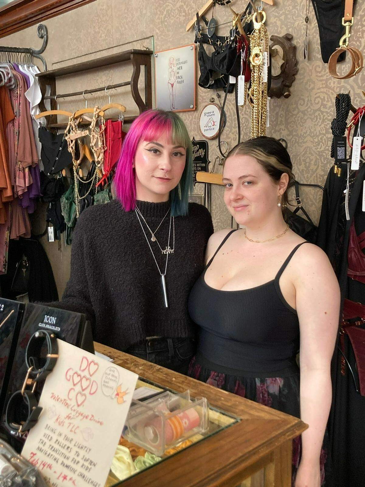 Kasey Burmood, 34, and Peyton West, 26, sell lingerie at Birdies, a shop celebrating its 21st anniversary on Valentine’s Day, Wednesday, Feb. 14. “It would have been ideal if the parade could have been on Friday,” said owner Peregrine Honig.