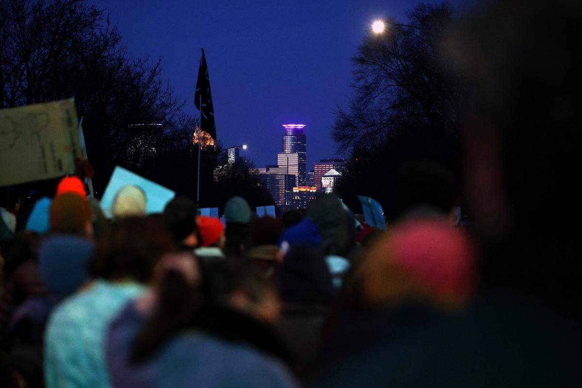 A view of the Minneapolis skyline during a vigil following a shooting by an ICE agent during federal law enforcement operations on January 07, 2026 in Minneapolis, Minnesota. According to federal officials, an ICE agent shot and killed Renee Nicole Good during a confrontation earlier today in south Minneapolis. (Photo by David Berding/Getty Images)