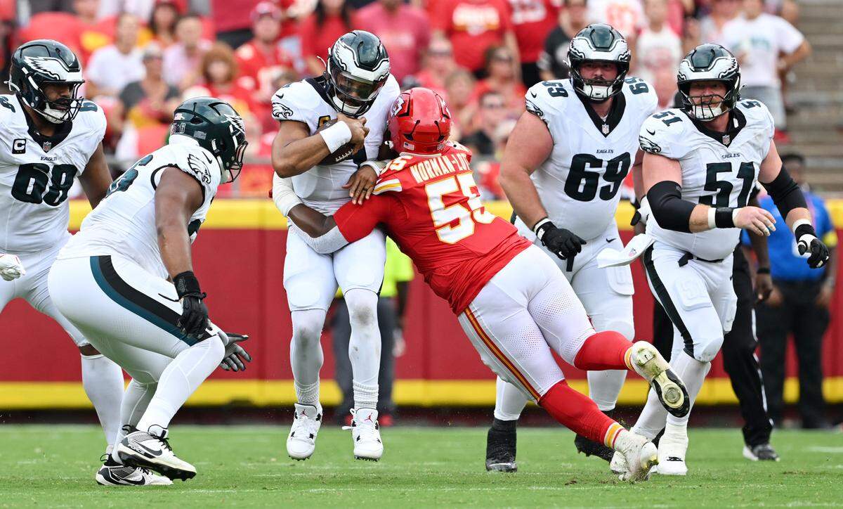 Kansas City Chiefs defensive tackle Omarr Norman-Lott (55) sacks Philadelphia Eagles quarterback Jalen Hurts (1) in the third quarter on Sunday, Sept. 14, 2025, at GEHA Field at Arrowhead Stadium.
