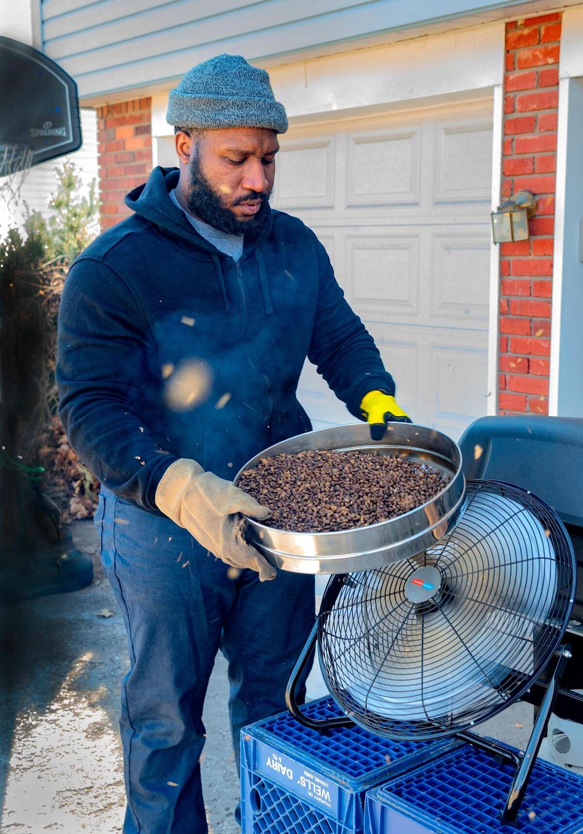 After Brent Rice takes the coffee beans out of the roaster, they need to be cooled with a high powered fan, which also blows the chaff off the beans.